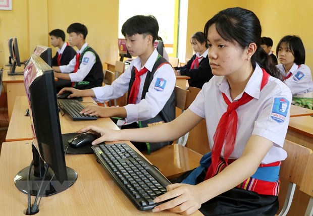 Giờ học tin học của học sinh Trường phổ thông Dân tộc nội trú THCS huyện Tân Sơn, tỉnh Phú Thọ. (Ảnh: Trung Kiên/TTXVN)