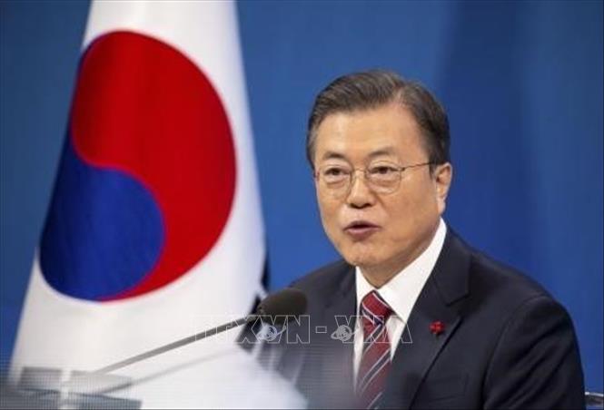 Tổng thống Hàn Quốc Moon Jae-in đã gửi lời chúc Tết nguyên đán bằng cả tiếng Hàn, tiếng Việt, tiếng Trung và tiếng Anh. Ảnh: Kyodo/TTXVN