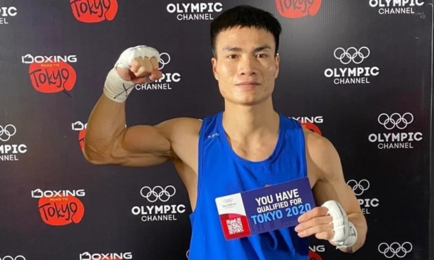  Vận động viên Nguyễn Văn Đương giúp môn boxing Việt Nam có vé dự Thế vận hội Olympic sau 32 năm chờ đợi.
