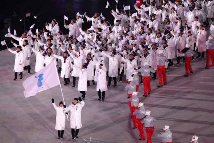 Đoàn thể thao Triều Tiên và Hàn Quốc cùng diễu hành dưới một lá cờ thống nhất tại Thế vận hội Mùa đông 2018. Ảnh: Getty Images