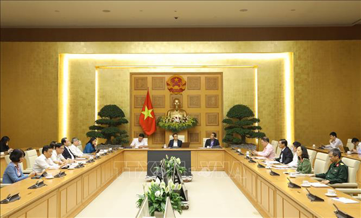Phó Thủ tướng Vũ Ðức Ðam chủ trì cuộc họp. Ảnh: Văn Điệp/TTXVN