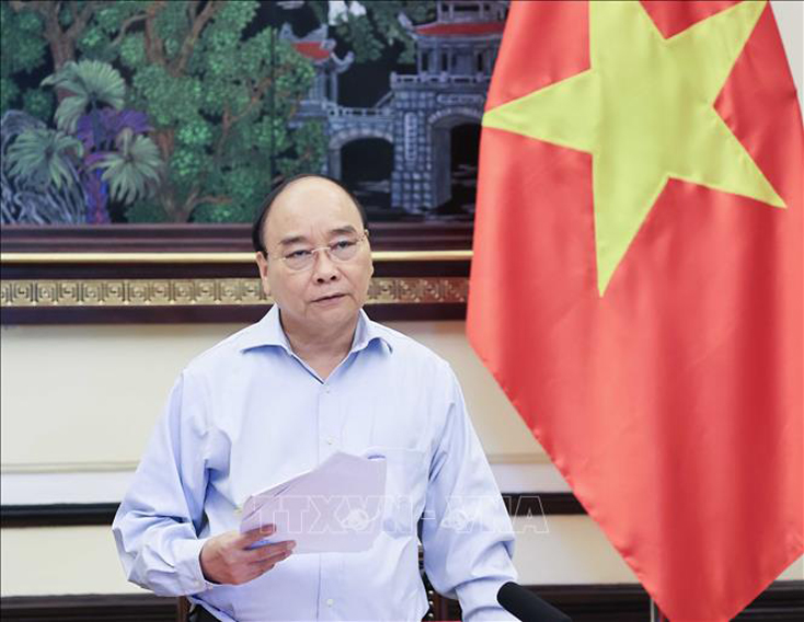 Chủ tịch nước Nguyễn Xuân Phúc, Trưởng Ban Chỉ đạo Cải cách tư pháp Trung ương. Ảnh: Thống Nhất/TTXVN