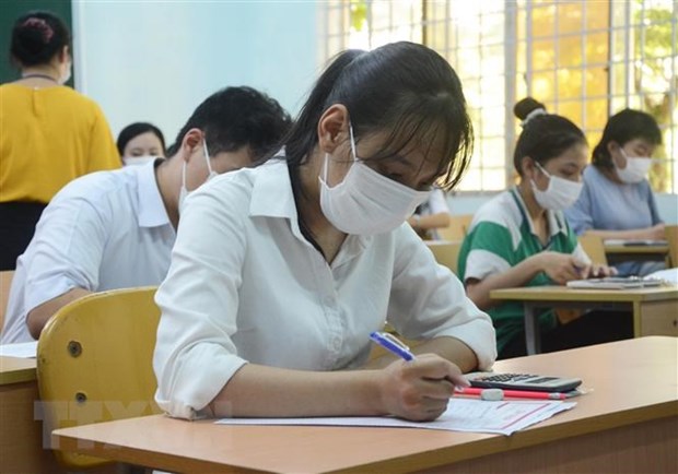  Thí sinh dự thi tốt nghiệp trung học phổ thông năm 2020. (Ảnh: TTXVN)