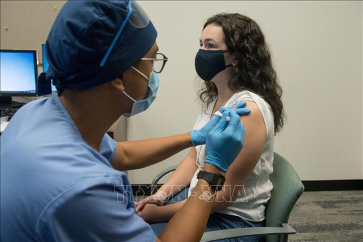 Tiêm vaccine ngừa COVID-19 tại Detroit, Michigan, Mỹ. Ảnh: AFP/TTXVN