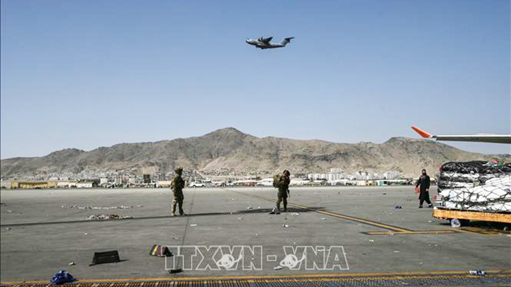 Binh sĩ Mỹ gác tại sân bay Kabul, Afghanistan ngày 16-8-2021. Ảnh minh họa: AFP/TTXVN