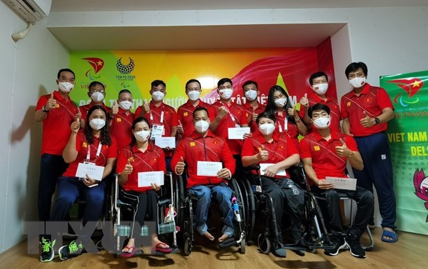 Đoàn thể thao người khuyết tật Việt Nam tại Paralympic Tokyo 2020. (Ảnh: Đào Thanh Tùng/TTXVN)