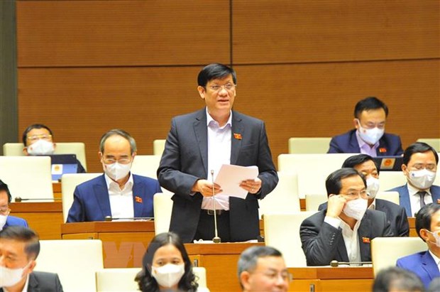 Bộ trưởng Bộ Y tế Nguyễn Thanh Long phát biểu giải trình, làm rõ một số vấn đề đại biểu Quốc hội nêu. (Ảnh: Minh Đức/TTXVN)