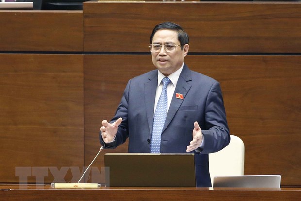 Thủ tướng Chính phủ Phạm Minh Chính trả lời chất vấn các vị đại biểu Quốc hội. (Ảnh: Doãn Tấn/TTXVN)