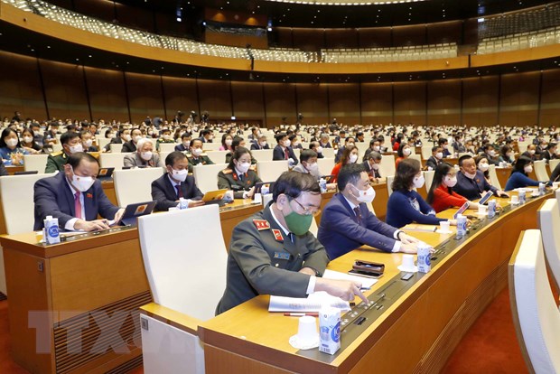 Các đại biểu biểu quyết thông qua Nghị quyết về quy hoạch sử dụng đất quốc gia thời kỳ 2021-2030. (Ảnh: Phương Hoa/TTXVN)