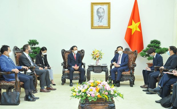 Phó Thủ tướng Lê Minh Khái tiếp Tổng Giám đốc Tổ hợp Samsung Việt Nam Choi Joo Hoo. (Ảnh: Minh Đức/TTXVN)