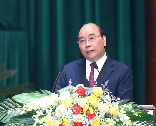 Chủ tịch nước Nguyễn Xuân Phúc phát biểu chỉ đạo tại hội nghị. Ảnh: Trọng Đức/TTXVN