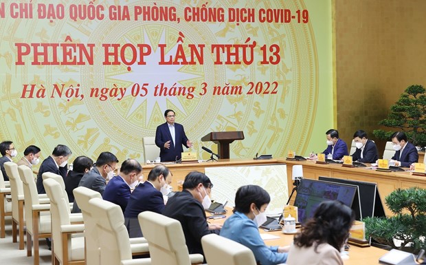 Thủ tướng Phạm Minh Chính chủ trì phiên họp lần thứ 13 Ban Chỉ đạo Quốc gia phòng, chống dịch COVID-19. (Ảnh: Dương Giang/TTXVN)