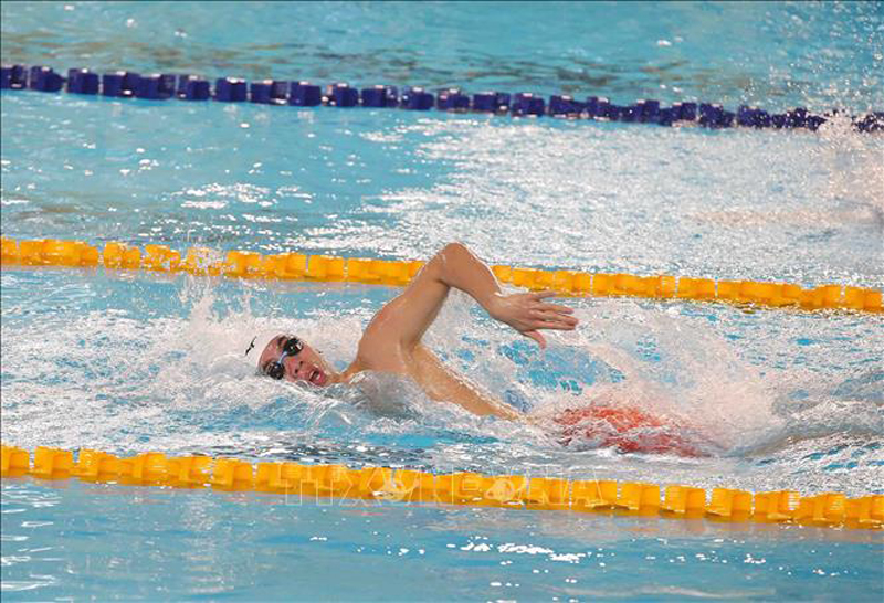 VĐV Nguyễn Huy Hoàng thi đấu xuất sắc đoạt HCV nội dung 1.500m bơi tự do nam với thành tích 15 phút 0 giây 75. Ảnh: Phạm Kiên/TTXVN