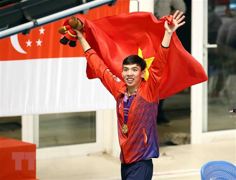 Vận động viên Nguyễn Huy Hoàng giành Huy chương Vàng nội dung 200m bơi bướm nam với thành tích 1 phút 58 giây 81. (Ảnh: TTXVN)