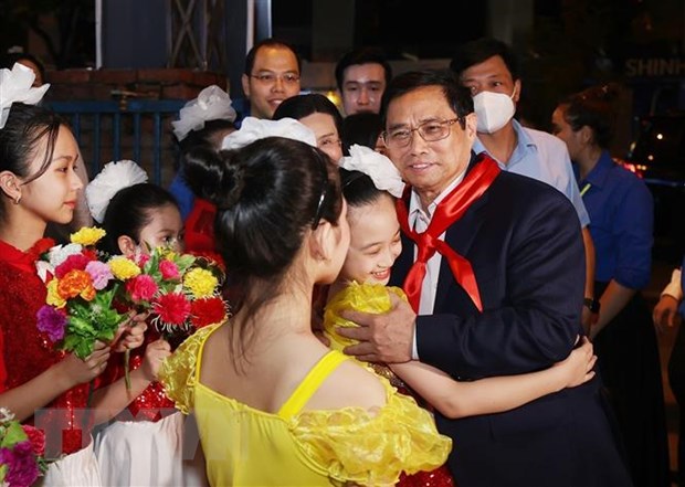 Thủ tướng Phạm Minh Chính đến dự Lễ phát động Tháng hành động vì trẻ em và khai mạc Hè năm 2022. (Ảnh: Dương Giang/TTXVN)