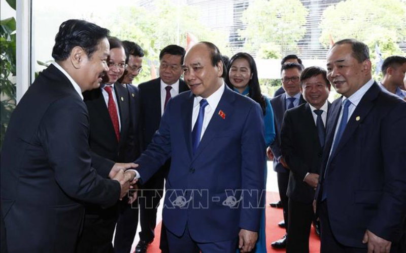 Chủ tịch nước Nguyễn Xuân Phúc với các đại biểu. (Ảnh: Thống Nhất/TTXVN) 