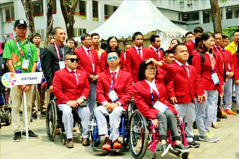 Đoàn Thể thao Người Khuyết tật Việt Nam tại Asian Para Games lần thứ 9 năm 2018 tham dự Lễ Thượng cờ. Ảnh (tư liệu): TTXVN
