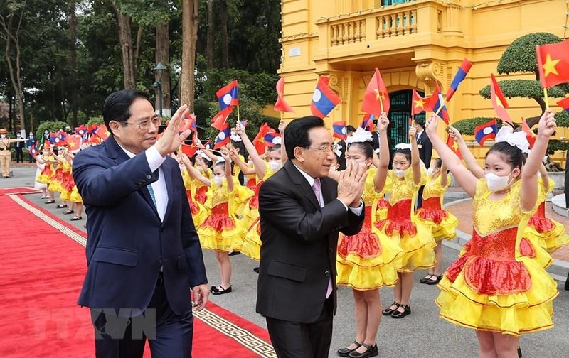 Thủ tướng Phạm Minh Chính chủ trì lễ đón Thủ tướng Lào Phankham Viphavanh thăm chính thức Việt Nam, tháng 1/2022. Ảnh: TTXVN