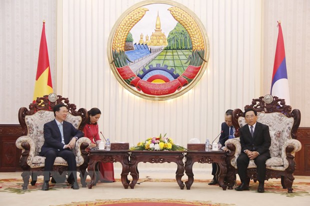 Thủ tướng Chính phủ Lào Phankham Viphavanh tiếp ông Võ Văn Thưởng, Ủy viên Bộ Chính trị, Thường trực Ban Bí thư. (Ảnh: Phạm Kiên/TTXVN)