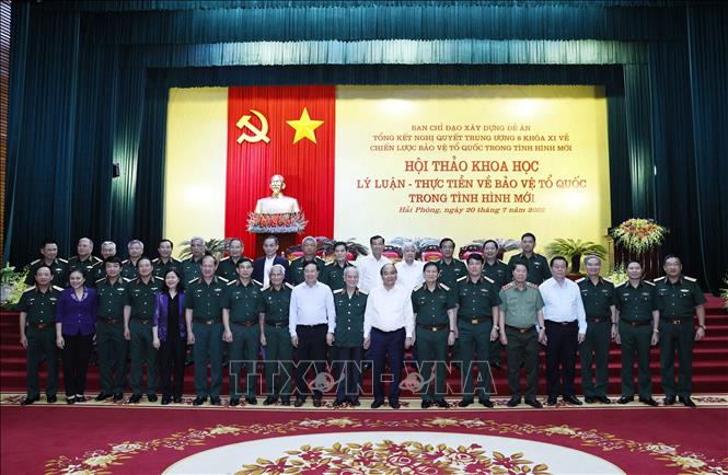 Chủ tịch nước Nguyễn Xuân Phúc với các đại biểu tham dự hội thảo. Ảnh: Thống Nhất/TTXVN