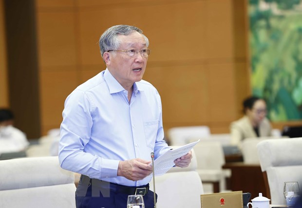 Chánh án Tòa án Nhân dân Tối cao Nguyễn Hòa Bình trình bày tờ trình. (Ảnh: Doãn Tấn/TTXVN)