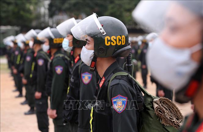 Cán bộ, chiến sỹ CSCĐ sẵn sàng lên đường làm nhiệm vụ hỗ trợ tỉnh Bắc Giang đảm bảo an ninh, trật tự và phòng, chống COVID-19. Ảnh tư liệu: Phạm Kiên/TTXVN