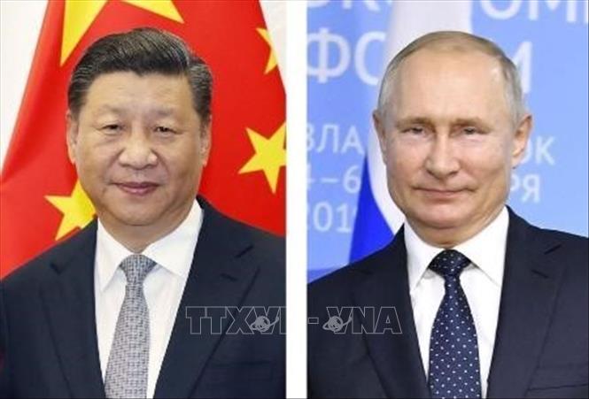 Chủ tịch Trung Quốc Tập Cận Bình (trái) và Tổng thống Nga Vladimir Putin. Ảnh: Kyodo/TTXVN