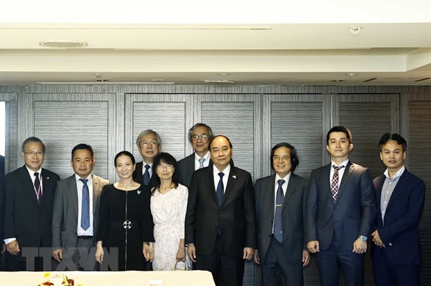 Chủ tịch nước Nguyễn Xuân Phúc gặp đại diện tri thức Việt Nam tiêu biểu tại Nhật Bản. (Ảnh: Thống Nhất/TTXVN)