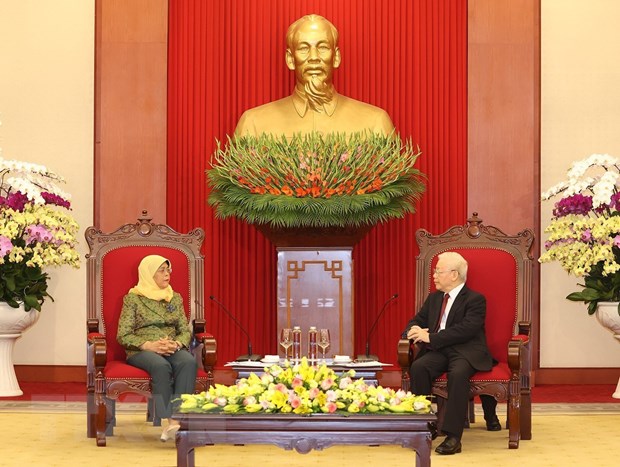 Tổng Bí thư Nguyễn Phú Trọng tiếp Tổng thống Singapore Halimah Yacob. (Ảnh: Trí Dũng/TTXVN)