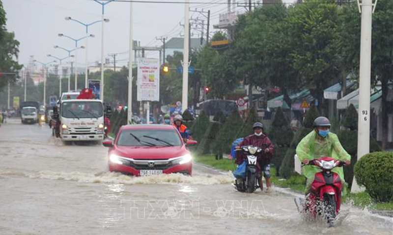 Cảnh báo mưa lớn tại Thanh Hoá đến Quảng Ngãi sẽ kéo dài đến 26/10. Ảnh: TTXVN.
