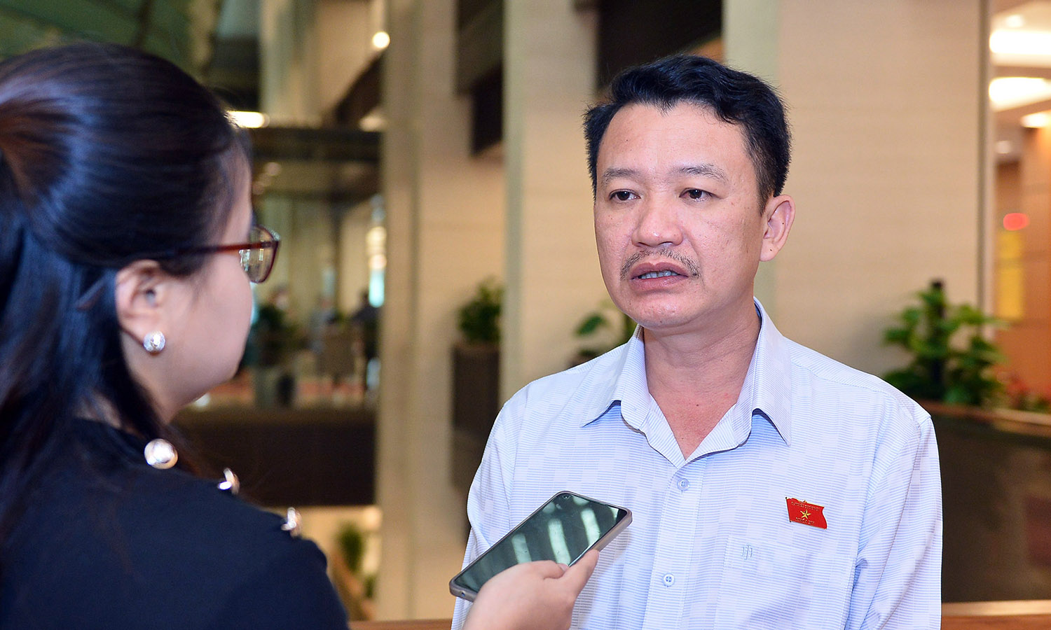 Đại biểu Trần Quang Minh trả lời phỏng vấn bên lề kỳ họp