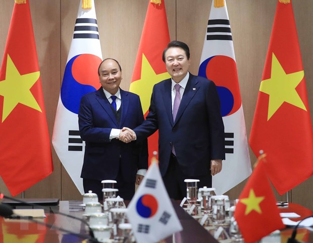 Chủ tịch nước Nguyễn Xuân Phúc và Tổng thống Hàn Quốc Yoon Suk-yeol tại buổi hội đàm. (Ảnh: Thống Nhất/TTXVN)