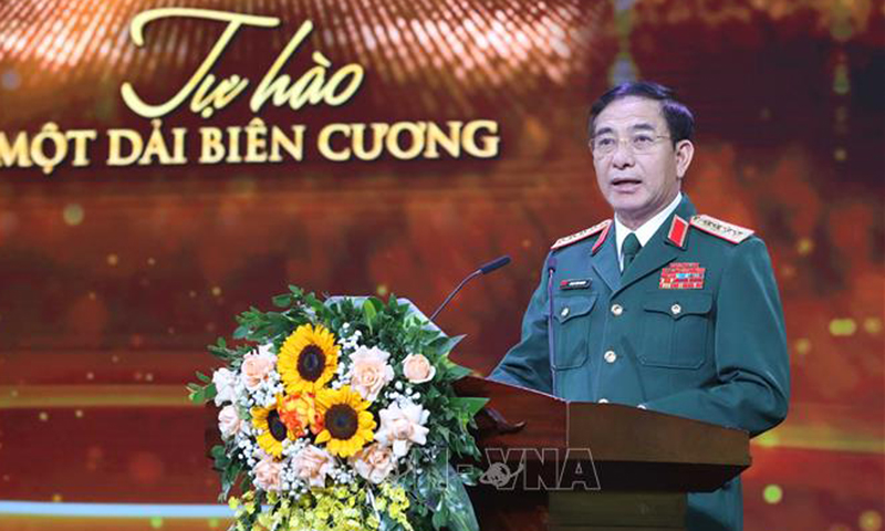 Đại tướng Phan Văn Giang, Uỷ viên Bộ Chính trị, Bộ trưởng Bộ Quốc phòng phát biểu tại Lễ trao giải ảnh. Ảnh: Phương Hoa/TTXVN
