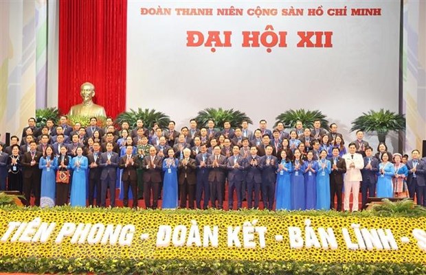 Tổng Bí thư Nguyễn Phú Trọng cùng các lãnh đạo Đảng, Nhà nước với các đại biểu dự đại hội. (Ảnh: Trí Dũng/TTXVN)
