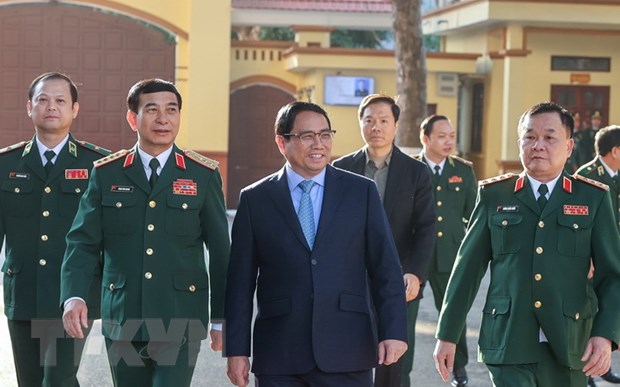 Thủ tướng Phạm Minh Chính đến thăm và làm việc với Bộ Tư lệnh Bộ đội Biên phòng. (Ảnh: Dương Giang/TTXVN)