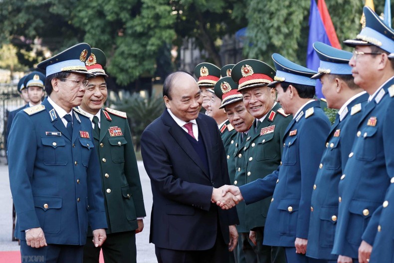 Chủ tịch nước Nguyễn Xuân Phúc với các đại biểu. (Ảnh: TTXVN)