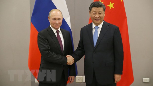 Tổng thống Nga Vladimir Putin và Chủ tịch Trung Quốc Tập Cận Bình. (Nguồn: Getty images)