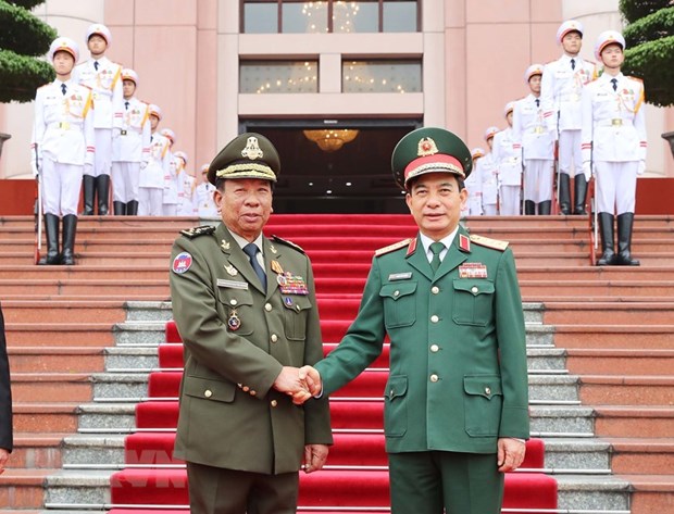 Đại tướng, Bộ trưởng Quốc phòng Phan Văn Giang và Đại tướng Tea Banh, Phó Thủ tướng, Bộ trưởng Quốc phòng Vương quốc Campuchia. (Ảnh: Trọng Đức/TTXVN)