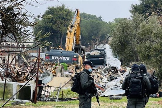 Cảnh sát Israel phá dỡ nhà ở của một gia đình người Palestine ở khu vực Sheikh Jarrah, Đông Jerusalem, ngày 19/1/2022. (Ảnh: THX/TTXVN)
