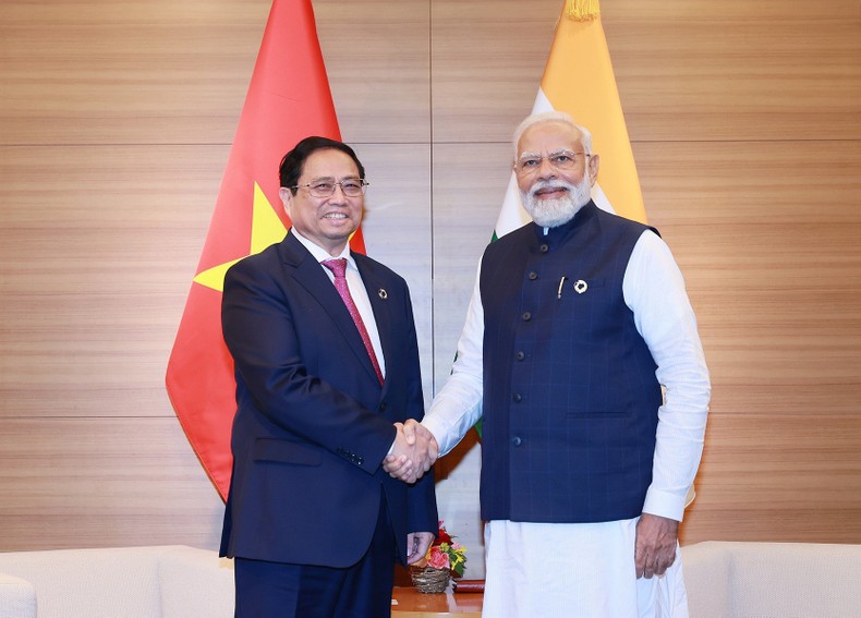 Thủ tướng Phạm Minh Chính gặp Thủ tướng Ấn Độ Narenda Modi. (Ảnh: Dương Giang)