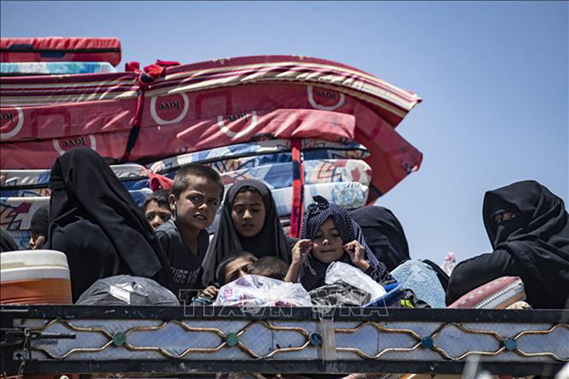 Người dân Syria sơ tán khỏi vùng chiến sự ở tỉnh Hasakeh ngày 2/6/2021. Ảnh minh họa: AFP/TTXVN