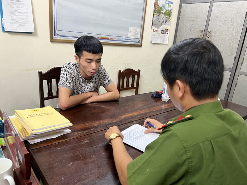 Đối tượng Bùi Tuấn Anh tại cơ quan công an.