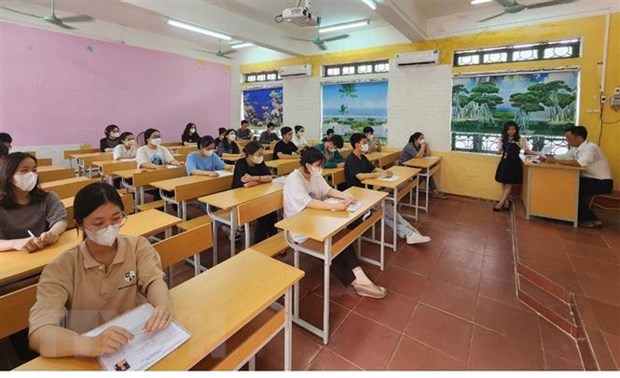 Thí sinh dự thi môn Ngữ văn tại điểm thi Trường THPT Nguyễn Thái Học, thành phố Vĩnh Yên. (Ảnh: Nguyễn Thảo/TTXVN)