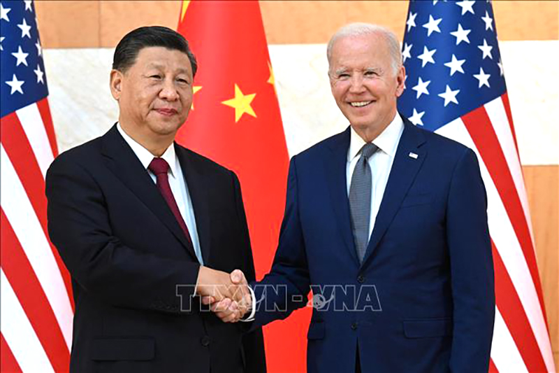 Tổng thống Mỹ Joe Biden (phải) và Chủ tịch Trung Quốc Tập Cận Bình (trái) tại cuộc gặp ở Bali, Indonesia, ngày 14/11/2022. Ảnh tư liệu: AFP/TTXVN