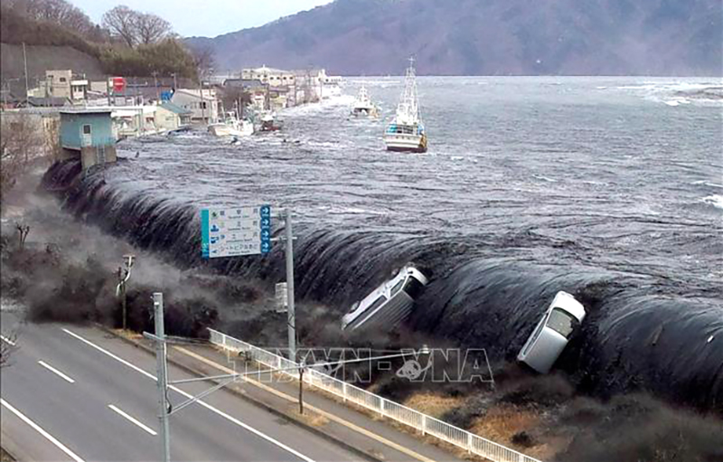 Cơn sóng thần lịch sử xảy ra sau thảm họa động đất tại thành phố Miyako, tỉnh Iwate, Nhật Bản ngày 11/3/2011. Ảnh: AFP/TTXVN