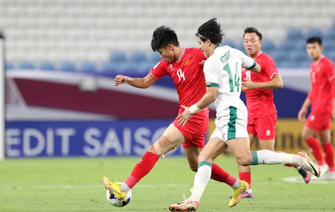 Tuyển U23 Việt Nam (áo đỏ) chia tay Vòng chung kết U23 châu Á 2024 sau thất bại 0-1 trước U23 Iraq. (Ảnh: AFC)