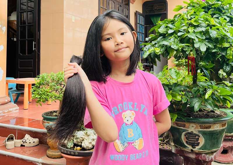 Tóc ngắn lại, để nụ cười dài thêm