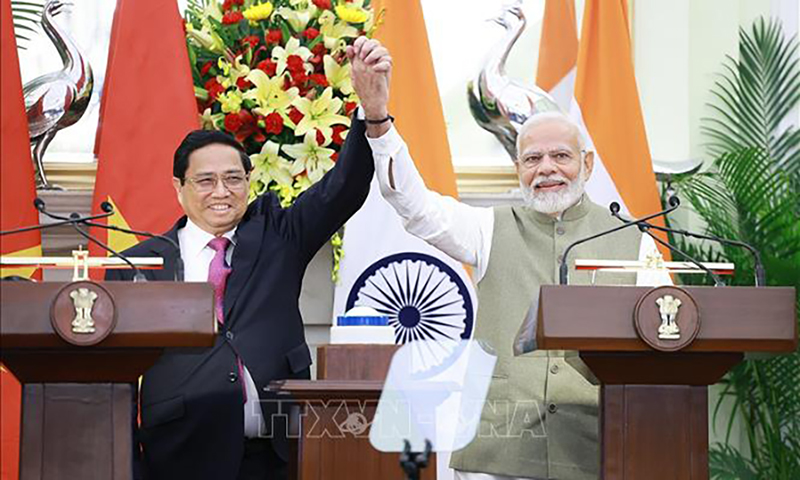 Thủ tướng Phạm Minh Chính​ và Thủ tướng Ấn Độ Narendra Modi tại cuộc gặp gỡ báo chí hai nước. Ảnh: Dương Giang/TTXVN