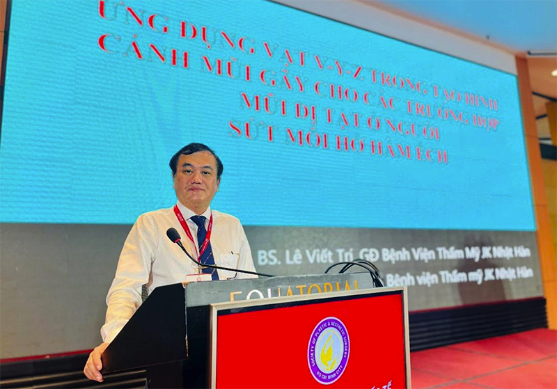 Bác sĩ Lê Viết Trí báo cáo tại hội nghị.
