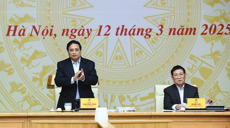 Thủ tướng Phạm Minh Chính chủ trì phiên họp lần thứ hai của Ban Chỉ đạo quốc gia về tài chính toàn diện. (Ảnh: TRẦN HẢI)